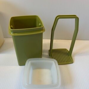 Vintage Tupperware medium pickle storage.